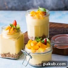 No Bake Mango Cheesecake Mousse served in elegant jars, perfect for gifting or individual portions.