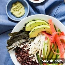 A tempting Vegetarian Sushi Bowl with Teriyaki Dressing, beautifully arranged in a white bowl, offering a deconstructed sushi experience.