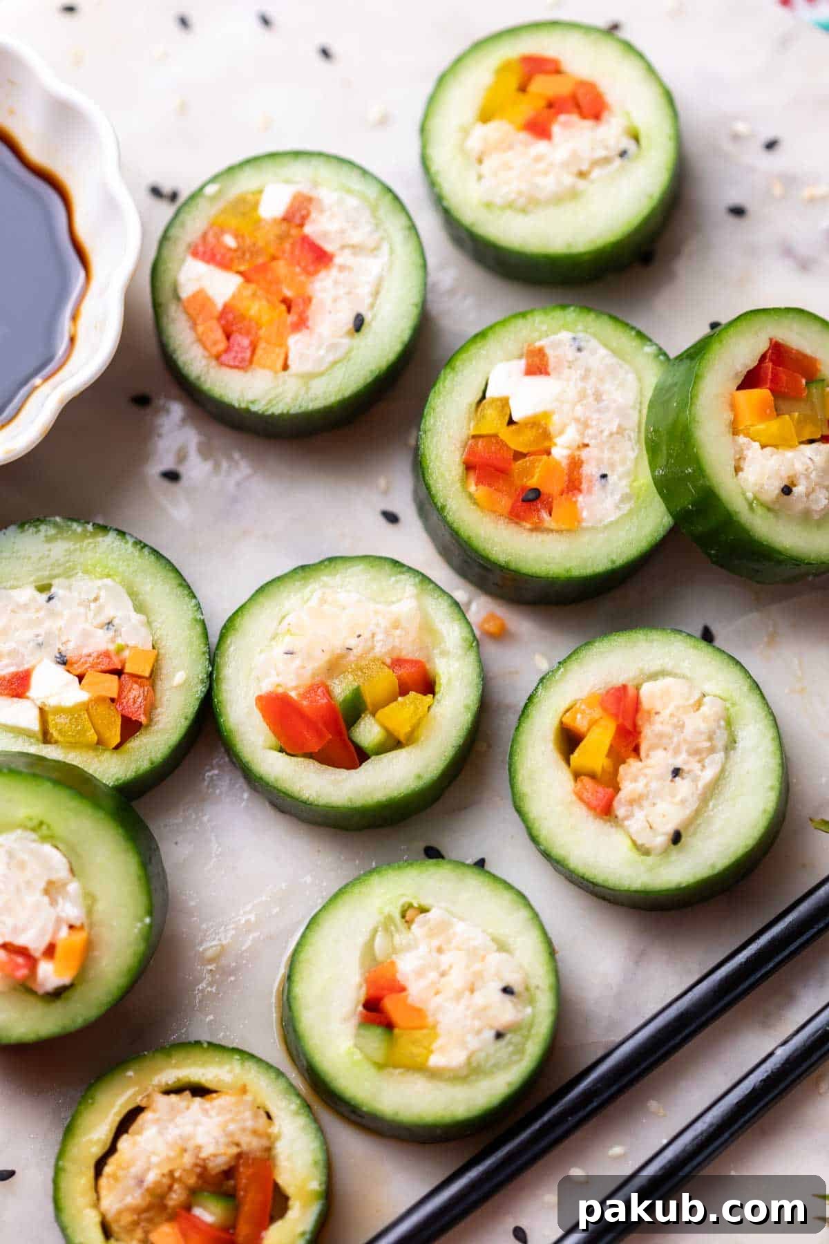 cucumber sushi served with chopsticks and soy sauce 