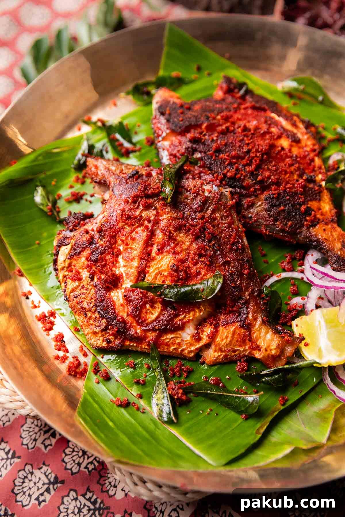 A beautifully presented Mangalorean Fish Fry with traditional accompaniments, ready to be enjoyed.