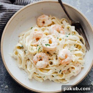 Creamy prawn scampi pasta, a quick pasta recipe where prawns or shrimp are tossed in a savory garlic, butter, and white wine sauce
