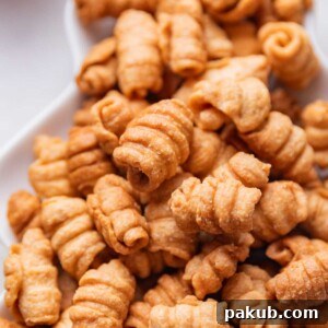 A close-up image of Kulkuls to show their crispy texture, arranged attractively.