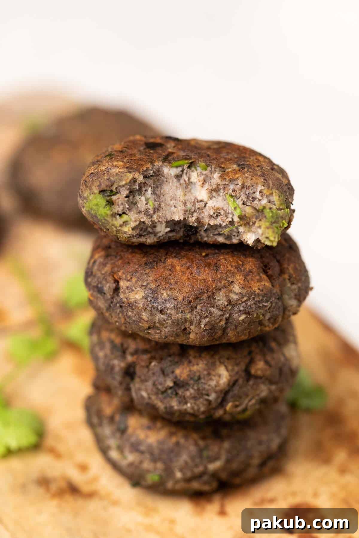 Kachhe kele ke kebab garnished and served on a brown board, highlighting its deliciousness and appeal