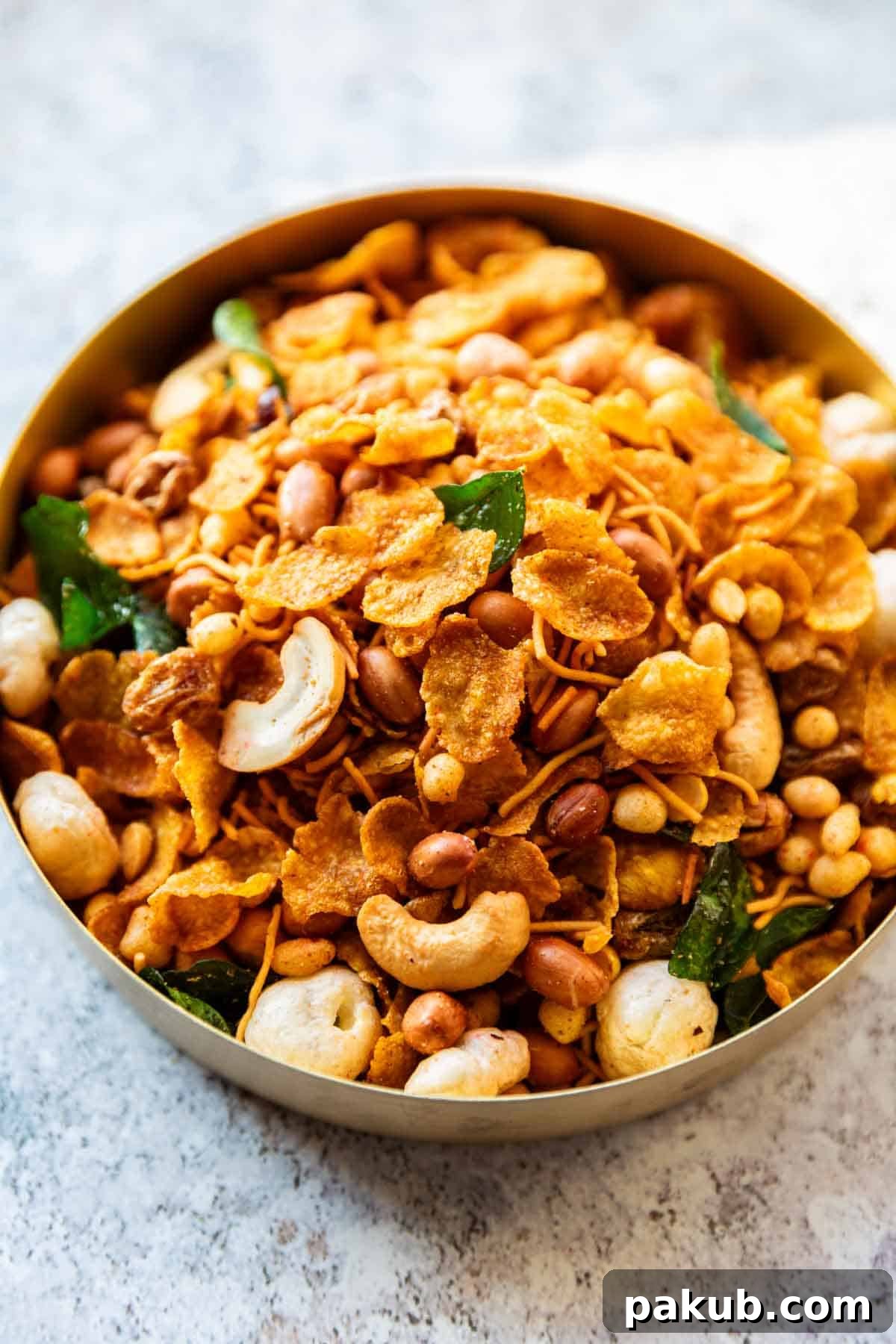 A bowl of freshly made, crispy Air Fryer Cornflakes Chivda ready to be enjoyed.
