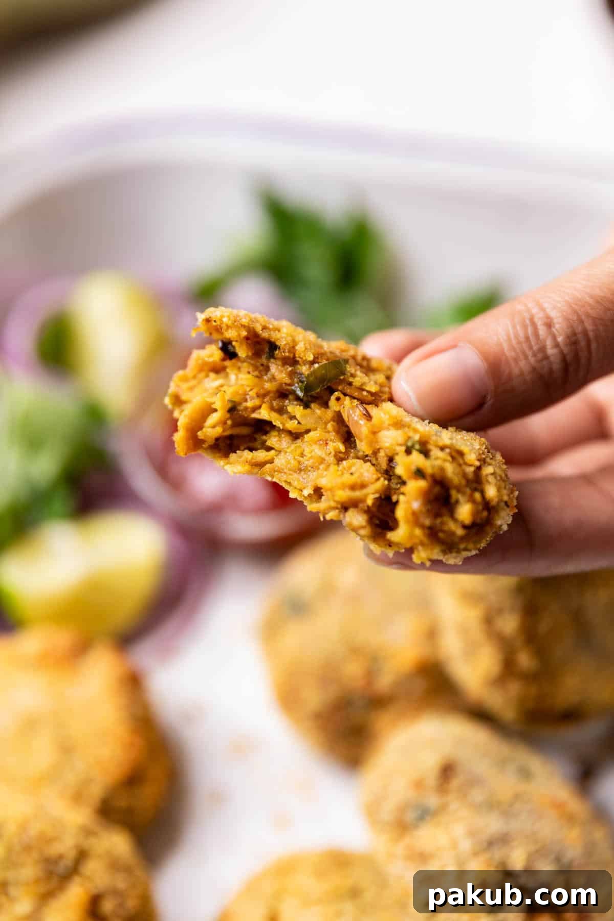 an image of an air fryer cutlet broken in half to show its texture