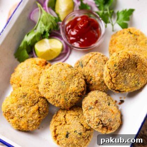 air fryer cutlet served in a white dish with accompaniments