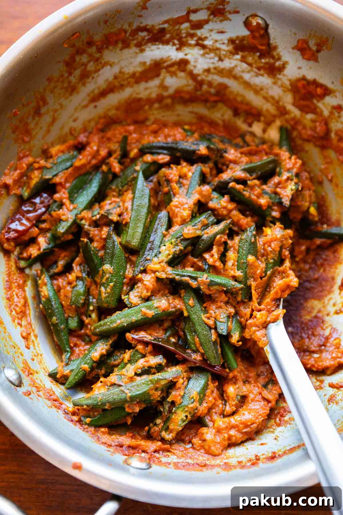 Classic Indian Dhaba Bhindi Masala 3 freshly made bhindi masala dhaba style still in the frying pan