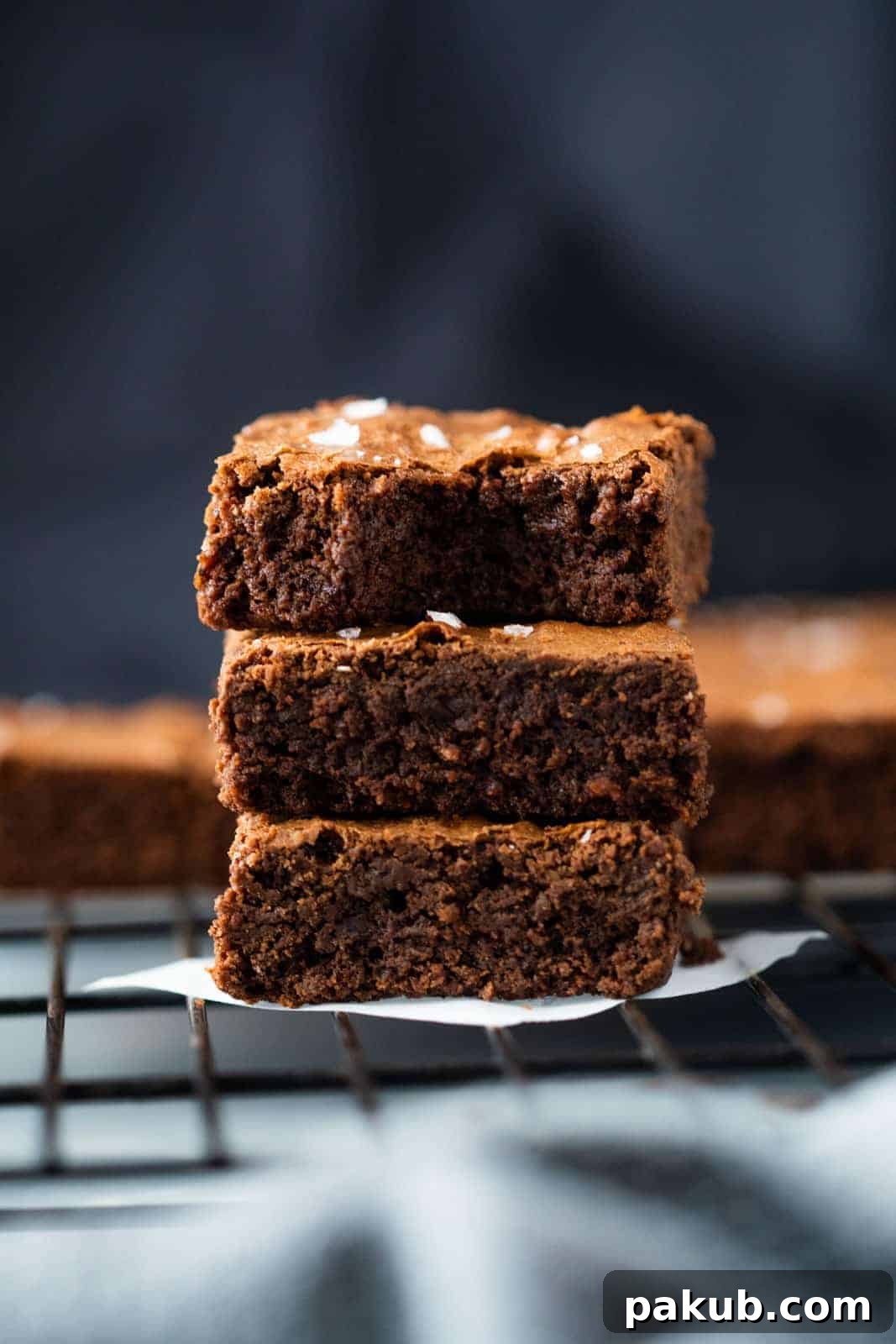 Stacked Chickpea Flour Brownies with a dusting of sea salt