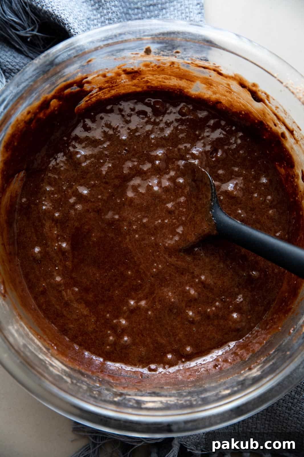 Rich chickpea flour brownie batter ready for baking