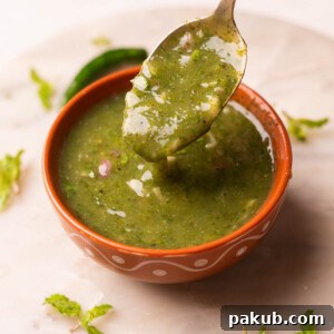 Himachali Mahni scooped up in a spoon, showing its thick texture