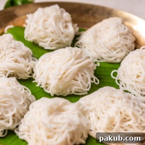 Rice idiyappams served on banana leaf in a plate