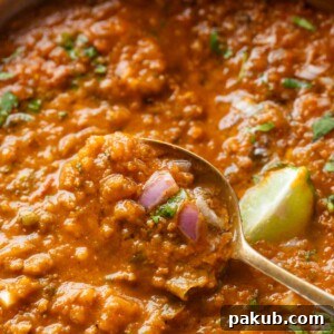 Close-up of pressure cooker pav bhaji to show its texture, rich and inviting.