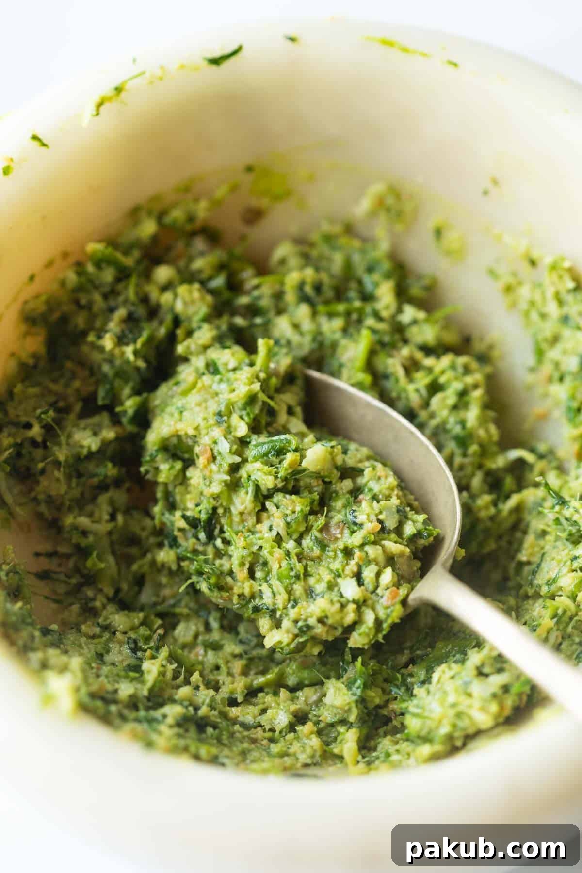 Thecha: India's Fiery Green Chili Paste Recipe 6 An inviting image of freshly pounded Thecha, showcasing its rustic texture and vibrant consistency.