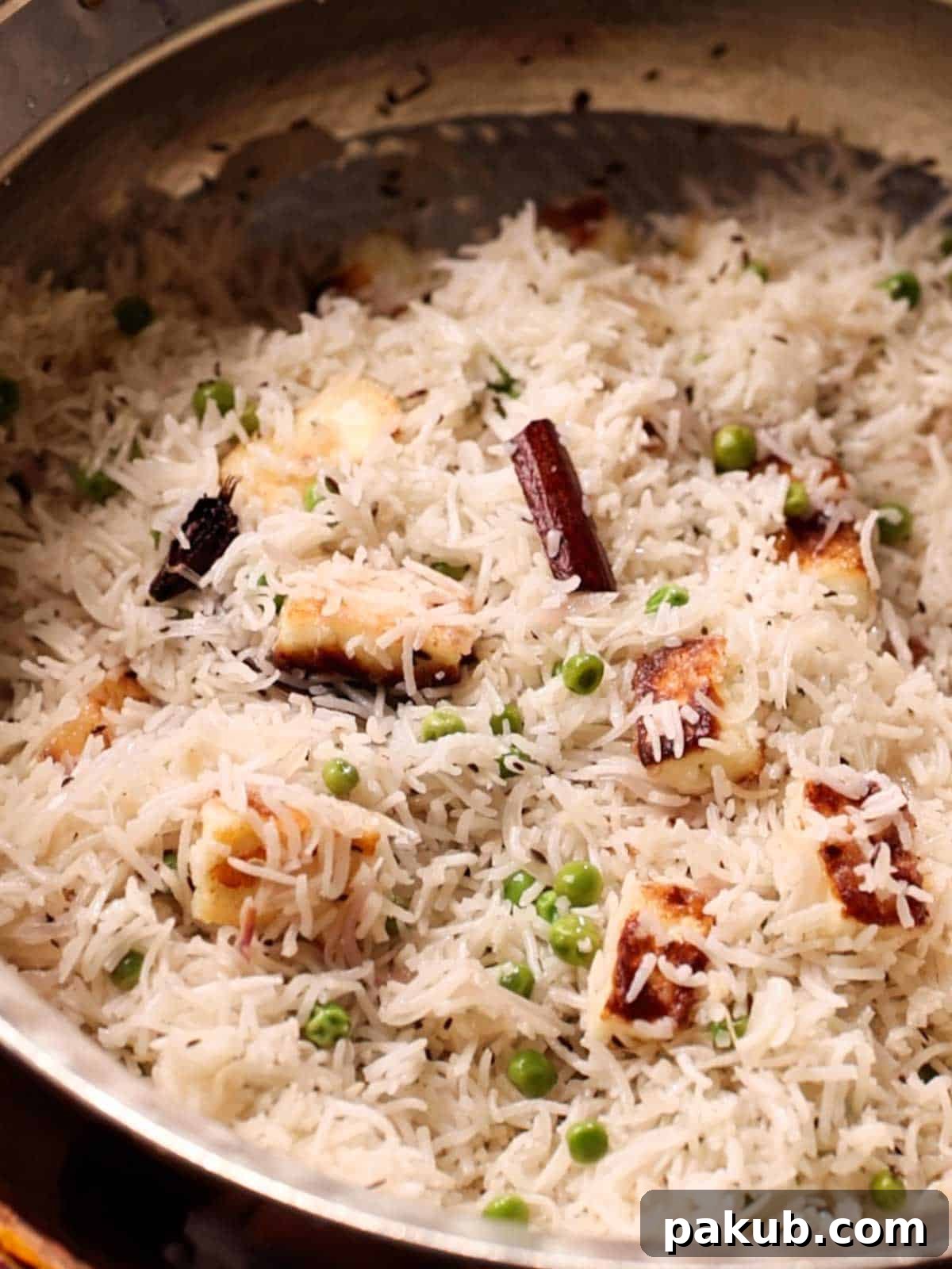 Aromatic Matar Paneer Pilaf 2 Delicious one-pot Matar Paneer Pulao with fluffy rice, paneer, and green peas
