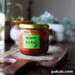 A bottle of prawn pickle labelled in green tape