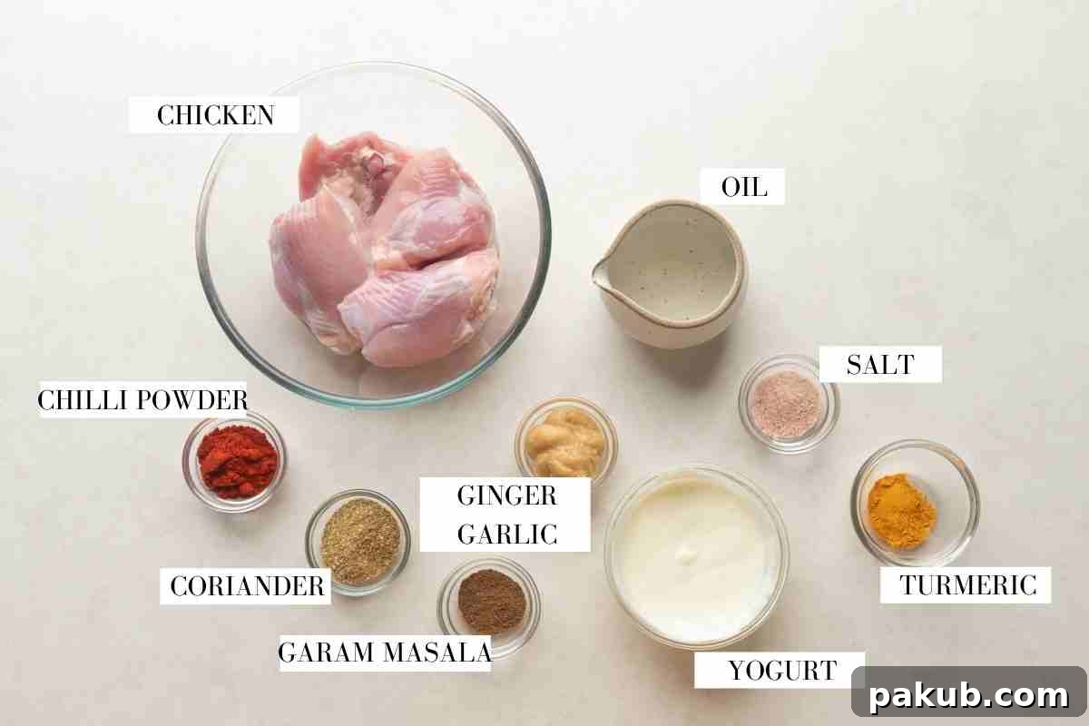 The Ultimate Creamy Butter Chicken 3 Picture of all the ingredients for butter chicken marinade with text to identify each ingredient