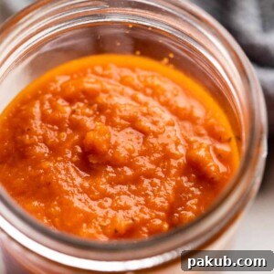 Rich homemade red pasta and pizza sauce in a jar.