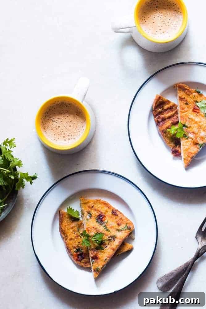 Authentic Masala French Toast Recipe Another view of the delicious Indian Masala Egg French Toast, perfectly golden brown and garnished, served alongside coffee.