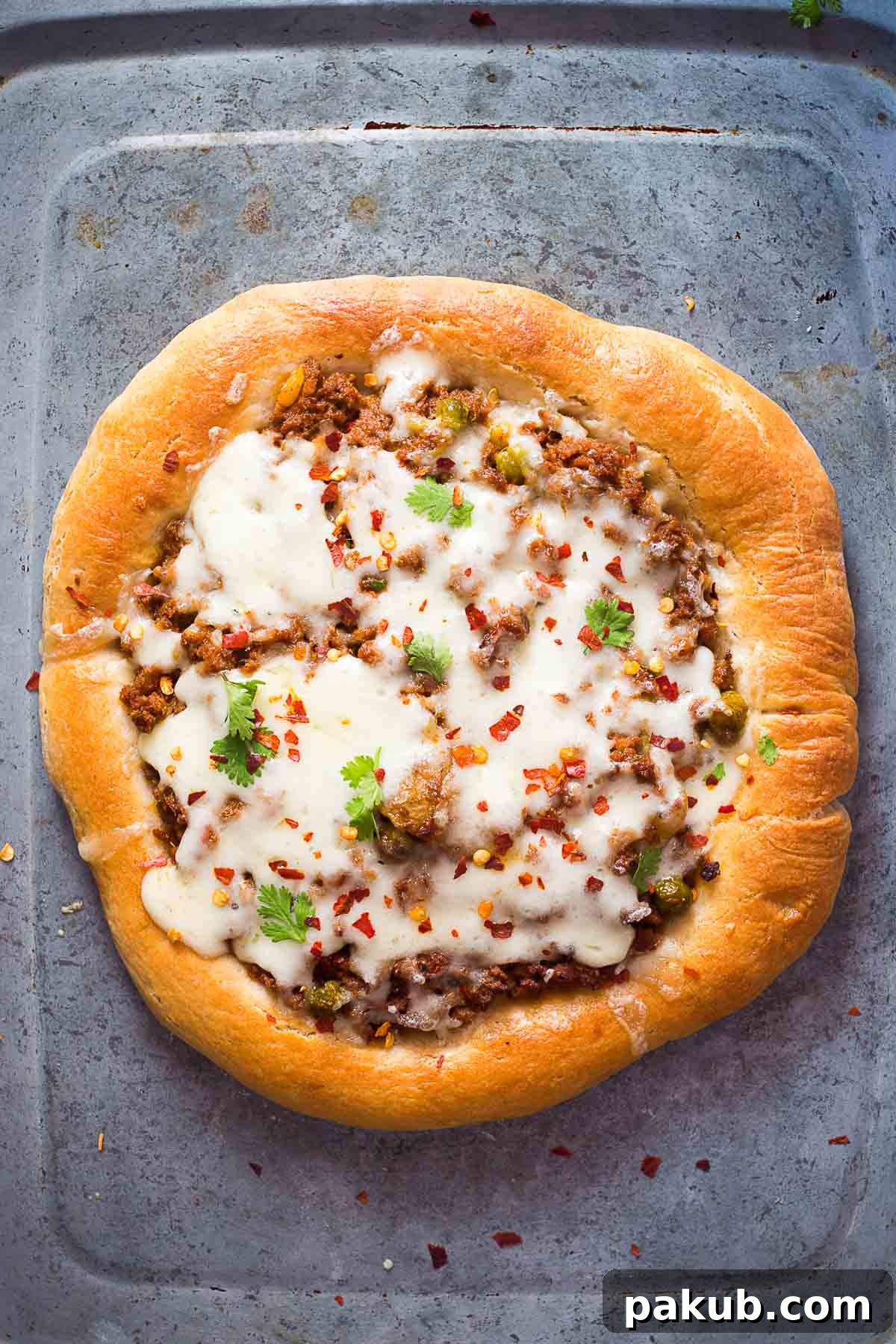 Wholesome Keema Lamb Pizza 3 Another perspective of the Wholewheat Keema Spiced Minced Lamb Pizza, showcasing its delicious topping