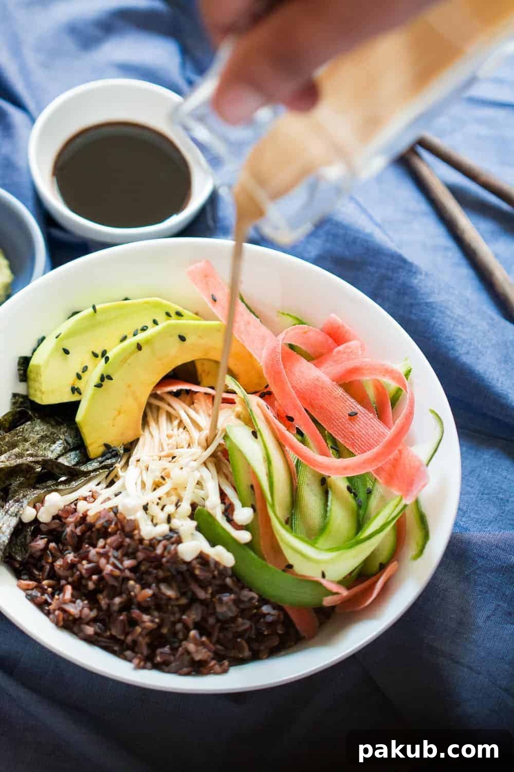Vegetarian Sushi Bowl Presentation Beautifully arranged vegetarian sushi bowl with teriyaki sauce