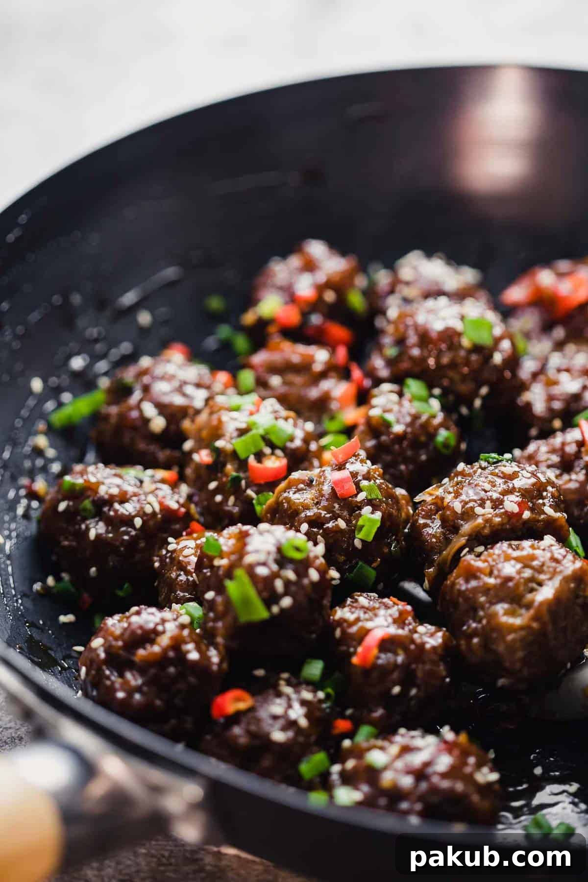 Irresistible Sticky Thai Meatballs A Fast Party Favorite 4 Close-up of Sticky Thai Meatballs in a wok, ready to be served