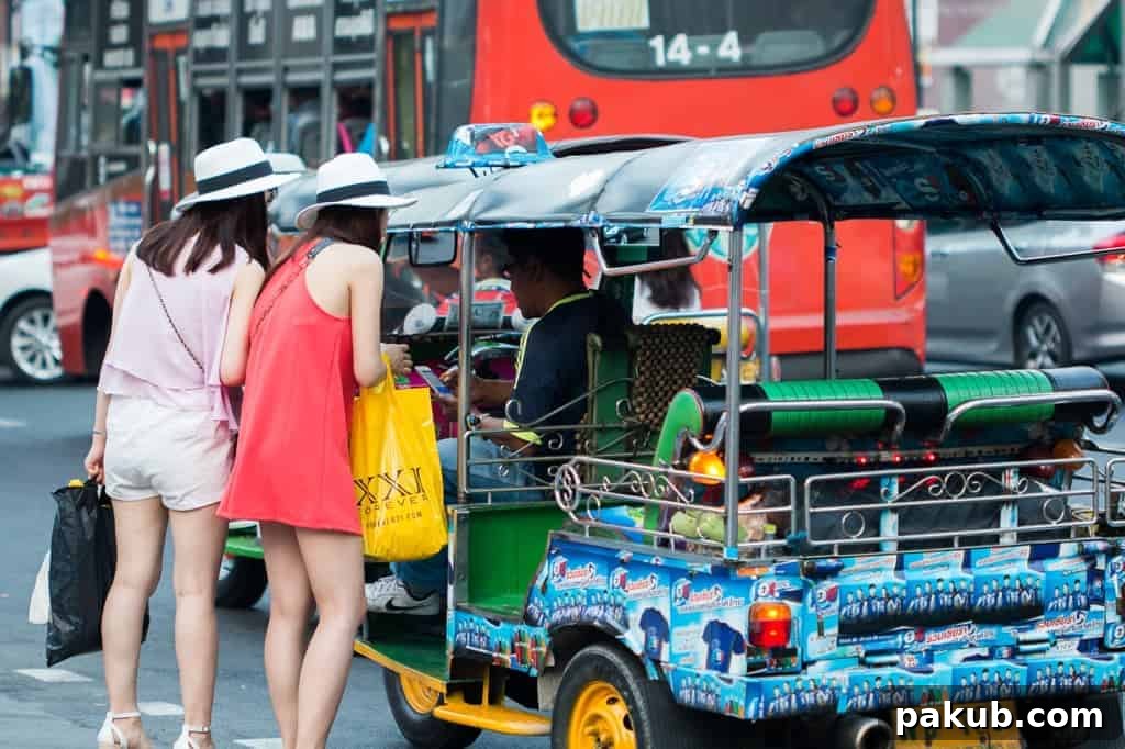Two Bangkok locals, one in a striking blue shirt, casually grabbing a brightly colored local transport, possibly a tuk-tuk, amidst the vibrant streetscape