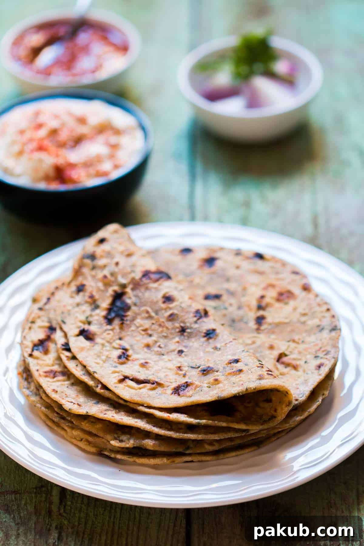 Aromatic Kasuri Methi Flatbread 3 A stack of perfectly golden-brown Kasuri Methi parathas, embodying a healthy and homely Indian meal.