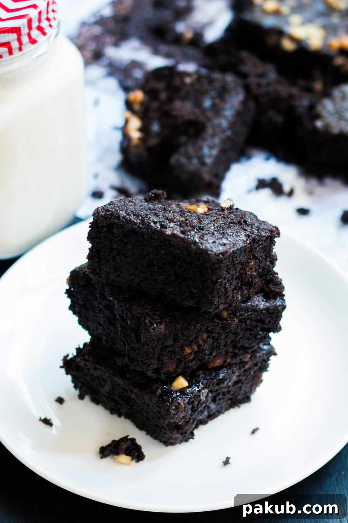 A stack of delicious eggless brownies, perfectly baked and ready for all vegetarian brownie enthusiasts.