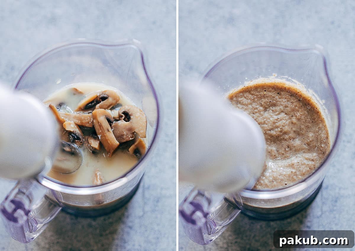 The process of blending the ingredients for the creamy mushroom soup using an immersion blender.