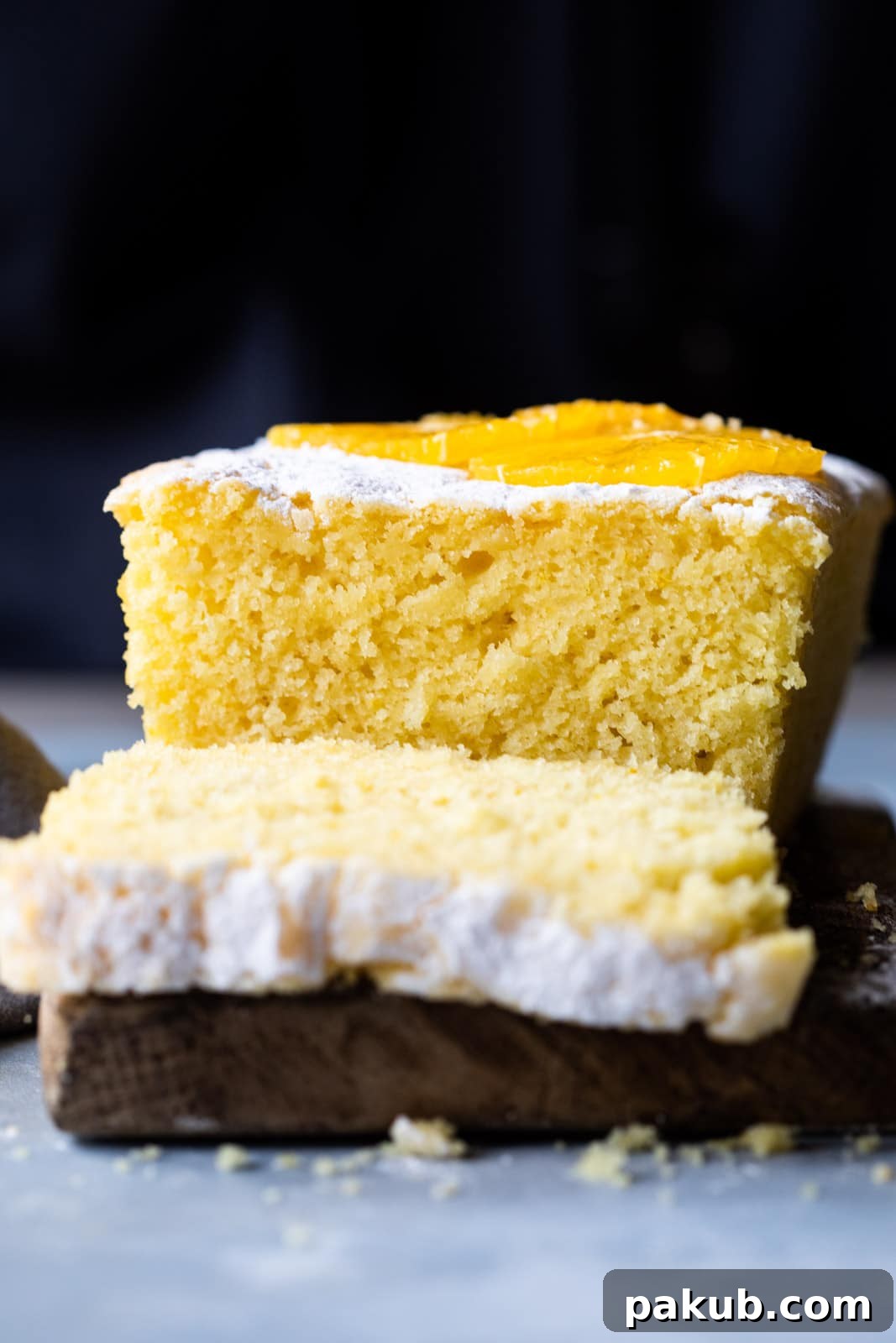 A close-up view of the moist and soft crumb of the Orange Buttermilk Pound Cake, highlighting its tender texture.