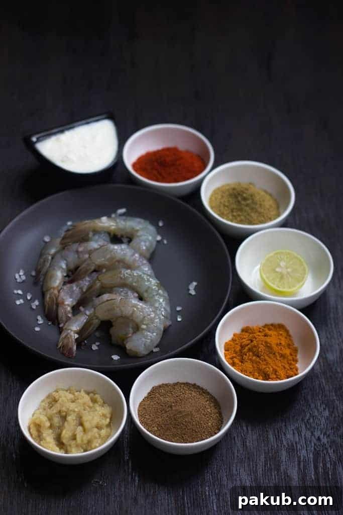 Tandoori Prawns Marinade Ingredients A visual guide showing fresh prawns alongside all the vibrant ingredients required for the flavorful tandoori marinade.