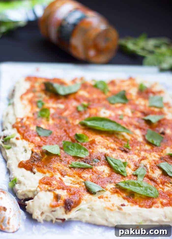 Pizza Bread with Sauce and Basil Step by step image of pizza bread with sauce and basil