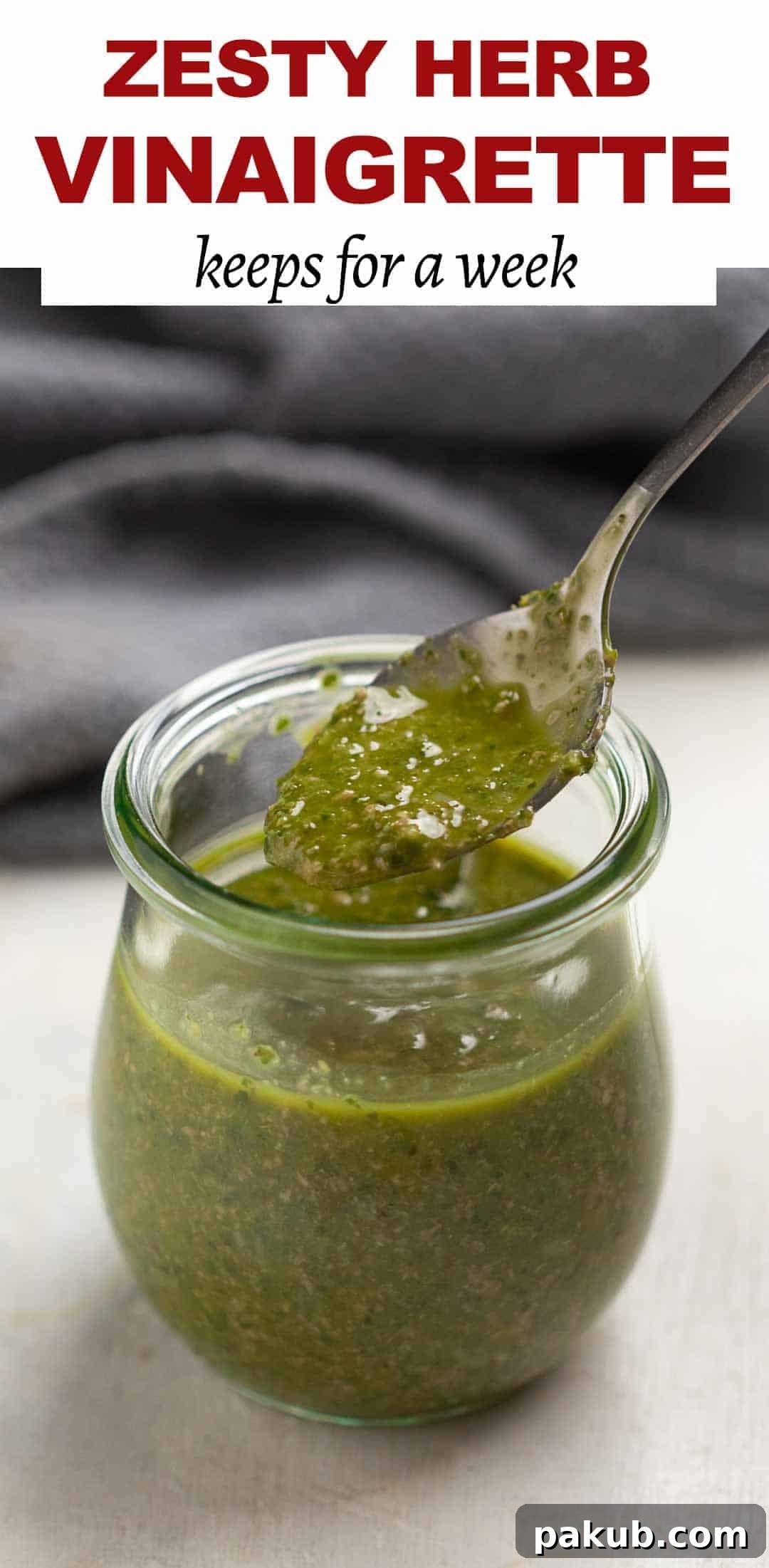 Three Game-Changing Salad Dressings for Your Kitchen 2 Herb vinaigrette in a jar with a spoon being taken out
