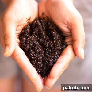 A picture of DIY Homemade Coffee Scrub in hands.