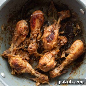 A picture of Quick Chicken with Caramelized Onions in a grey pan