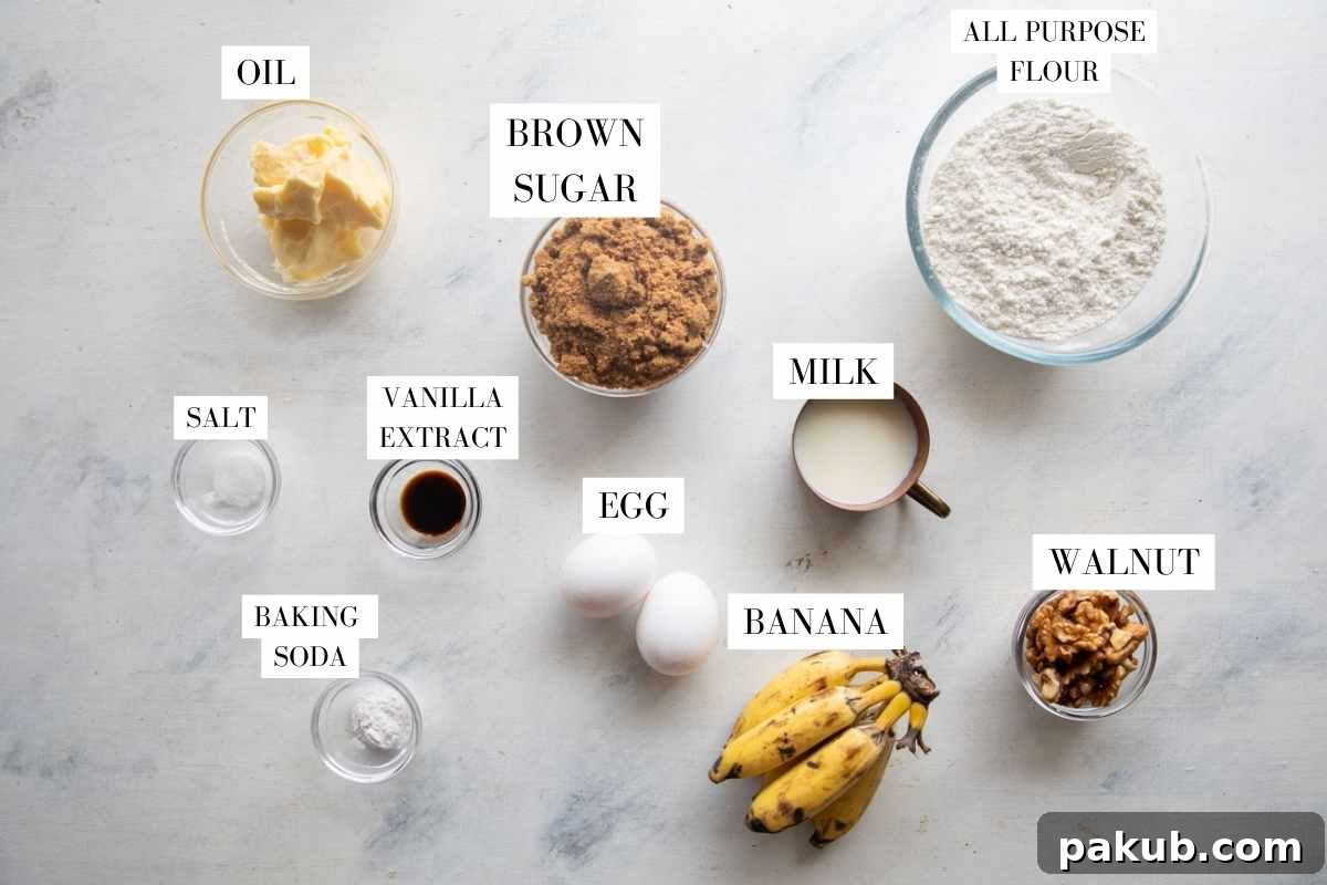 Caramelized Butter Banana Bread 3 A flat lay photograph displaying all the fresh ingredients required for making Brown Butter Banana Bread, clearly labeled for easy identification.