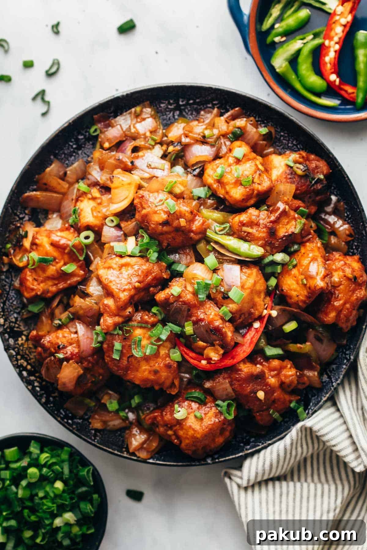 Easy Chinese Chilli Chicken Dry in a black wok.