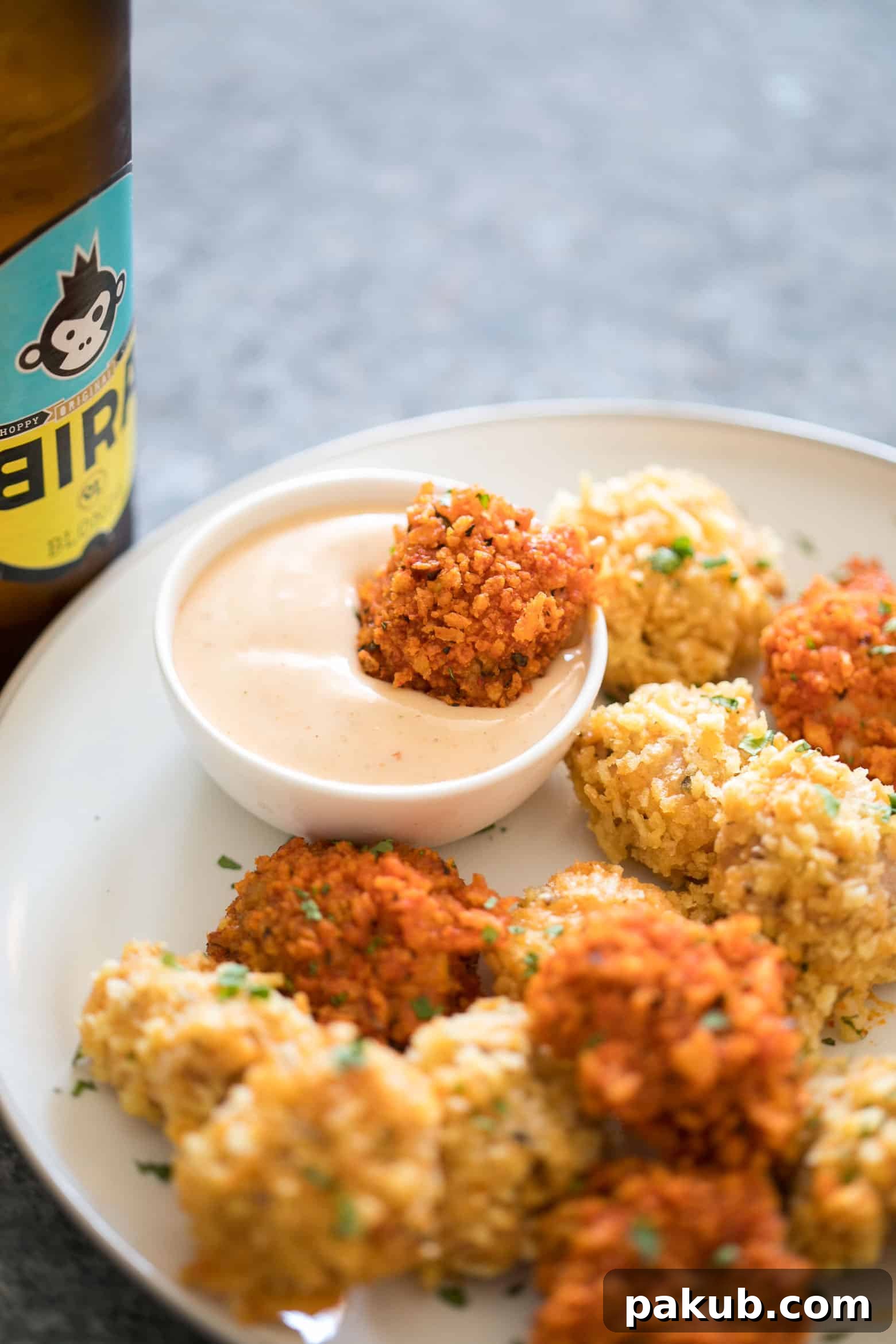Baked Popcorn Chicken: KFC Flavor, No Fryer 4 The easiest recipe for baked popcorn chicken that can be made two ways - spicy and non spicy! Tastes KFC style, but gluten free and guilt free for the perfect party appetizer.