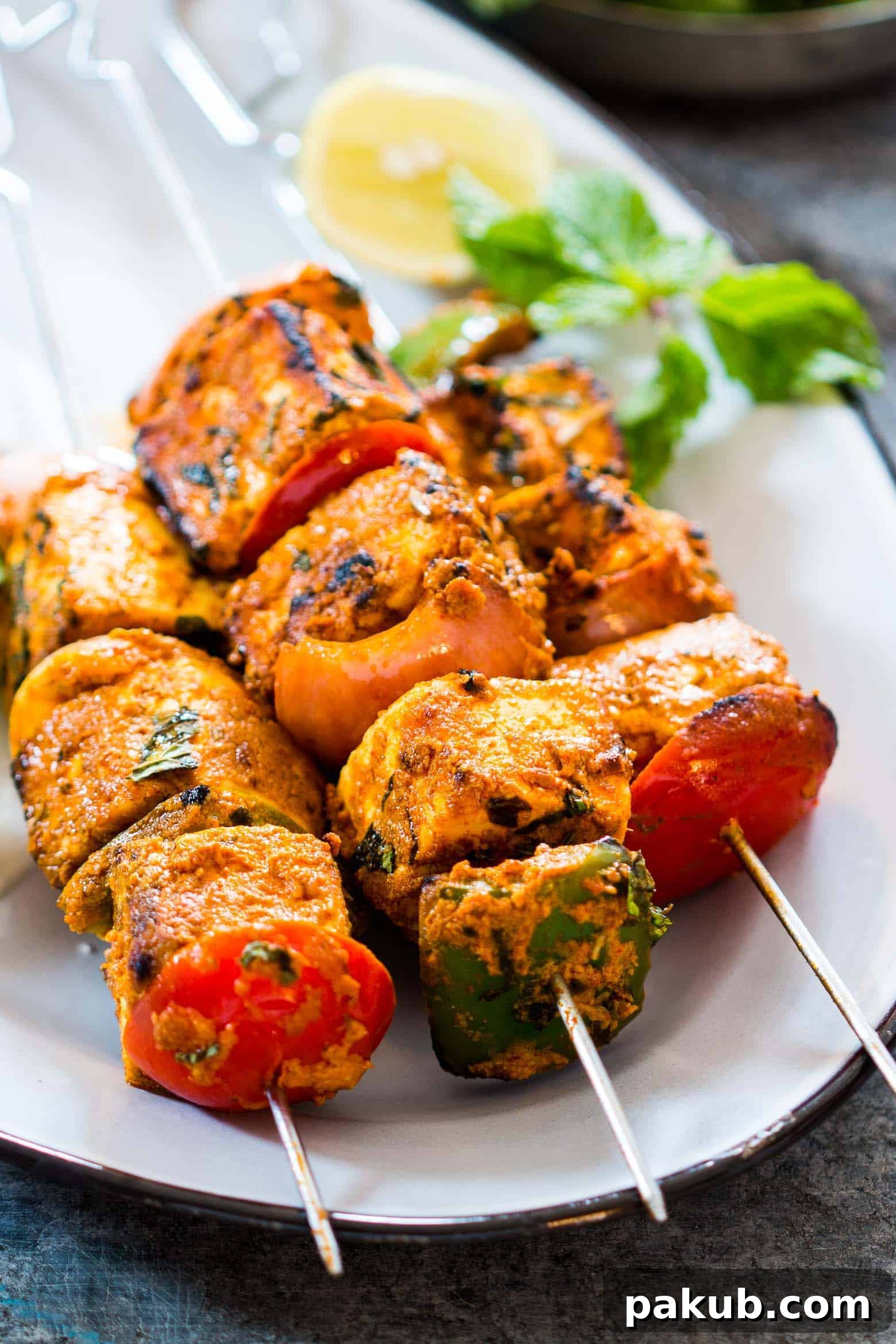 Oven-Baked Tandoori Paneer Tikka 5 Another view of perfectly marinated paneer and vegetables, highlighting the readiness for the oven to transform them into Tandoori Paneer Tikka.