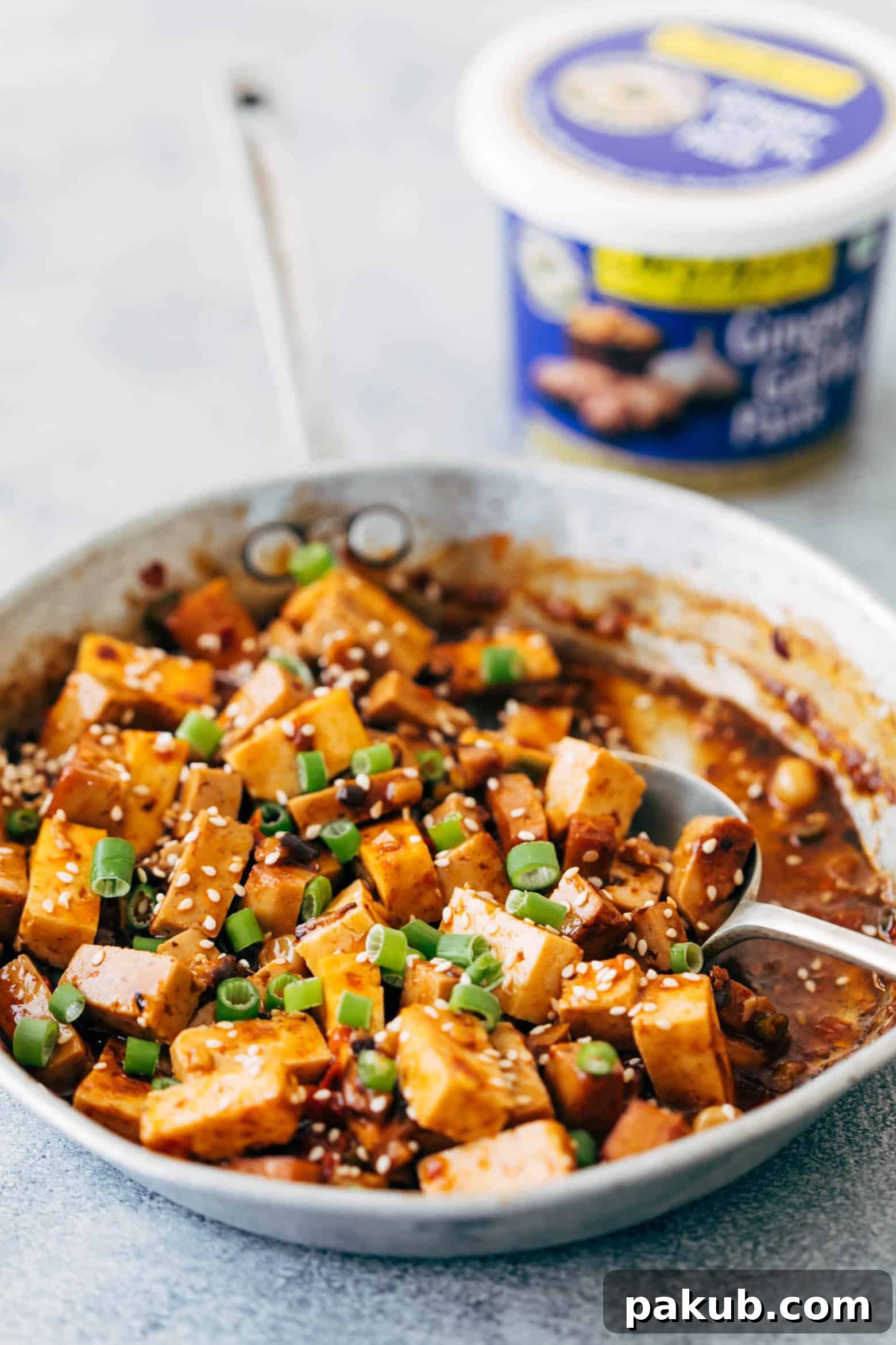 Close-up of freshly prepared vegetarian mapo tofu filling, showcasing the rich texture and vibrant colors.