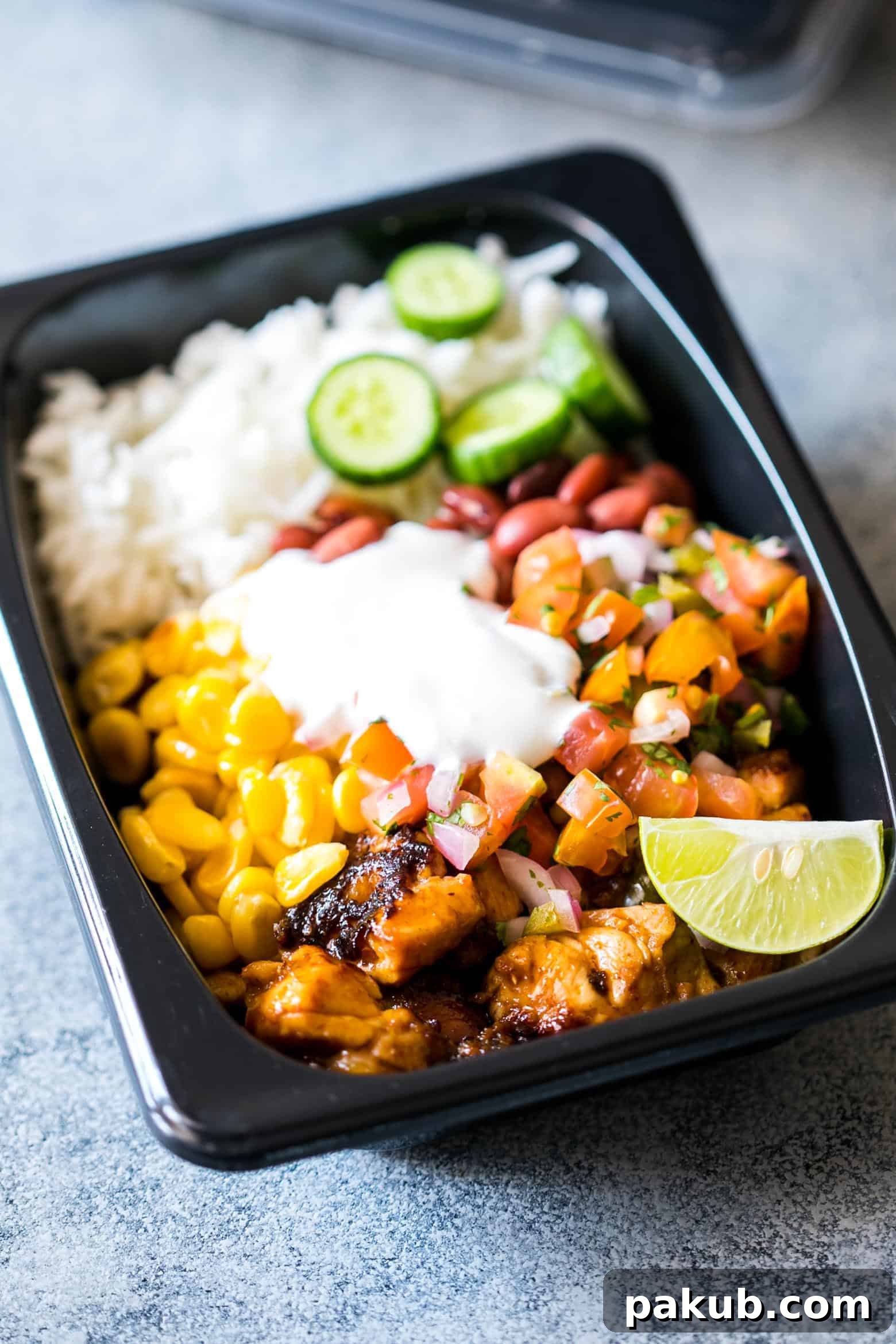 Easy Gluten Free Chicken Burrito Meal Prep Bowls 4 Another view of the healthy chicken burrito meal prep bowls, perfectly portioned.