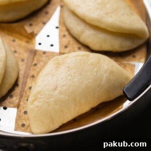 close up image of steamed bao buns to showcase their texture
