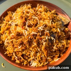 Plant-Based Soya Keema Biryani 5 Veg soya keema biryani served in a brown bowl