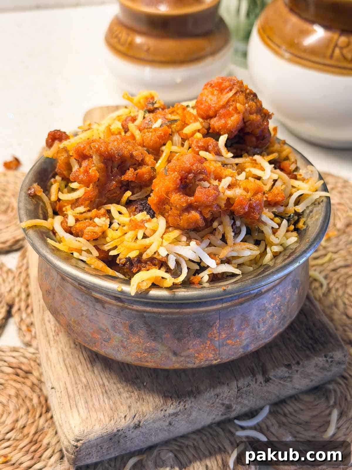 Crispy Cauliflower 65 Biryani 3 gobi 65 served in a handi style vessel