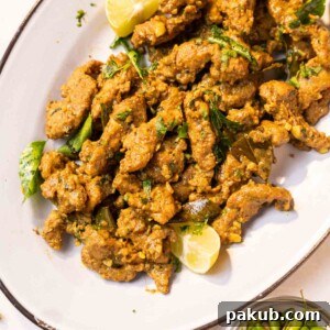 Succulent Chicken Majestic served on a pristine white platter with vibrant accompaniments, showcasing its appealing presentation.