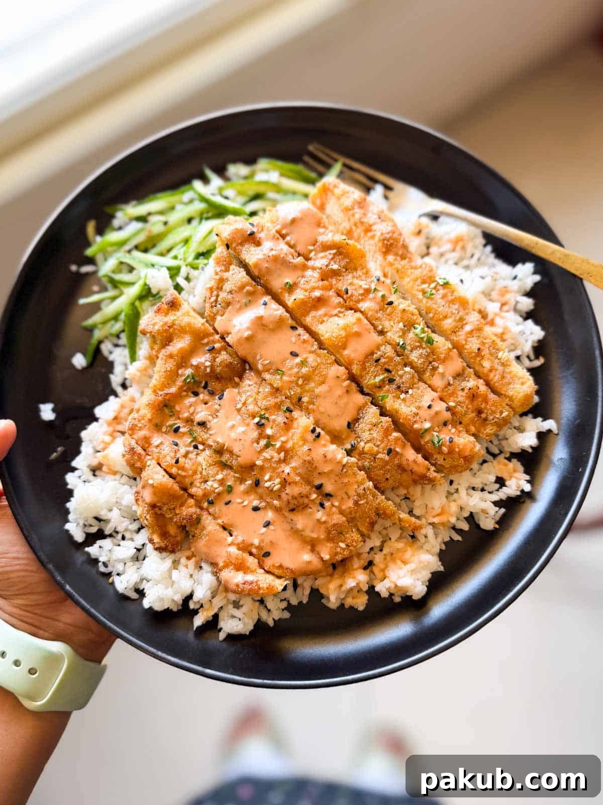 Air-Fried Golden Katsu Rice Bowl 4 Beautifully arranged chicken katsu rice bowl, showcasing the full meal with all its vibrant ingredients, ready to be enjoyed