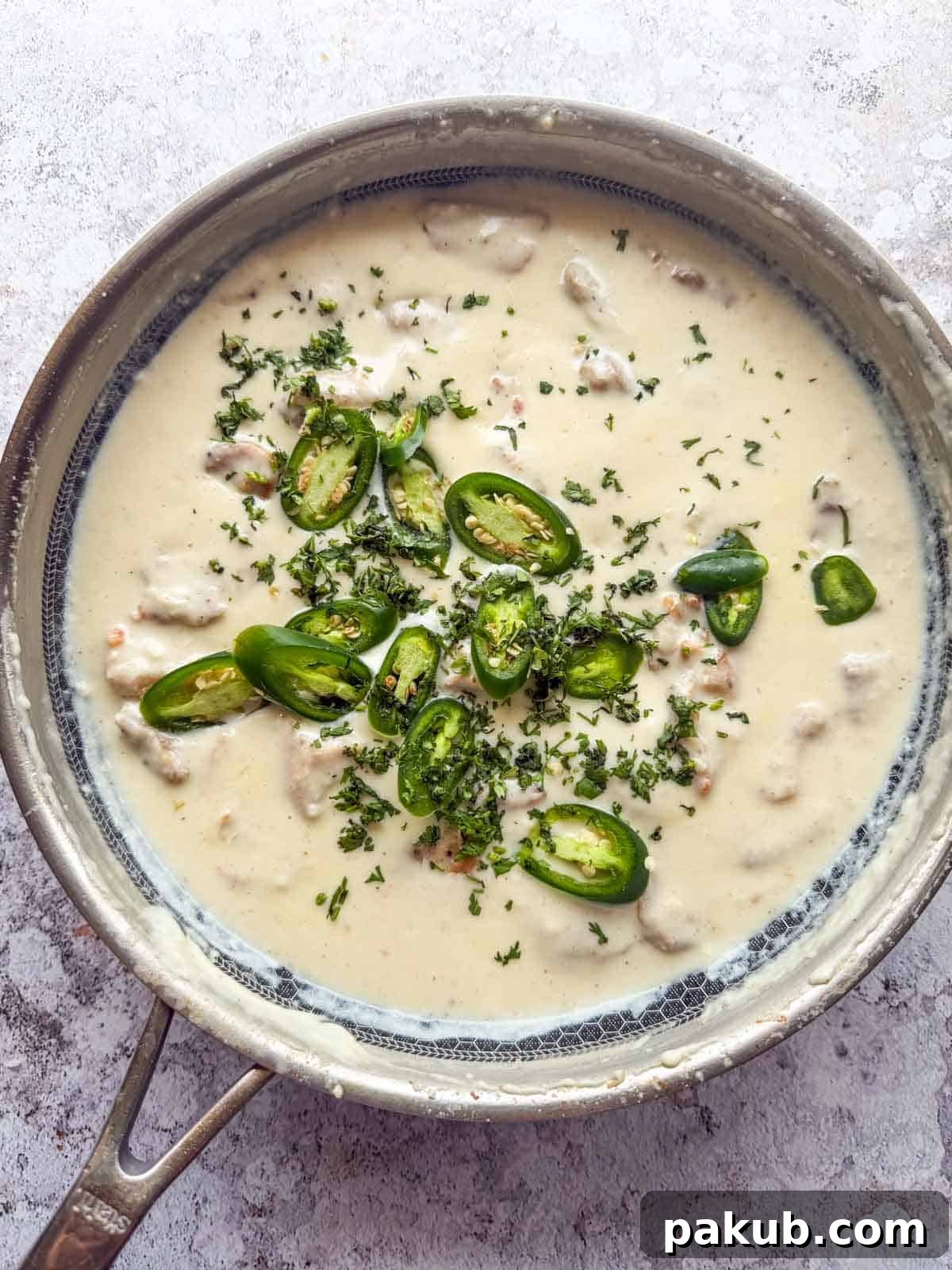 freshly made creamy japan chicken still in its cooking saucepan