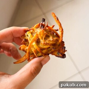 A close-up image of air fryer veg pakora to show its crispy texture