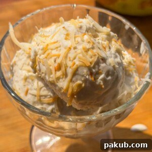 A close-up image of tender coconut ice cream to showcase its creamy texture, featured in the recipe card.