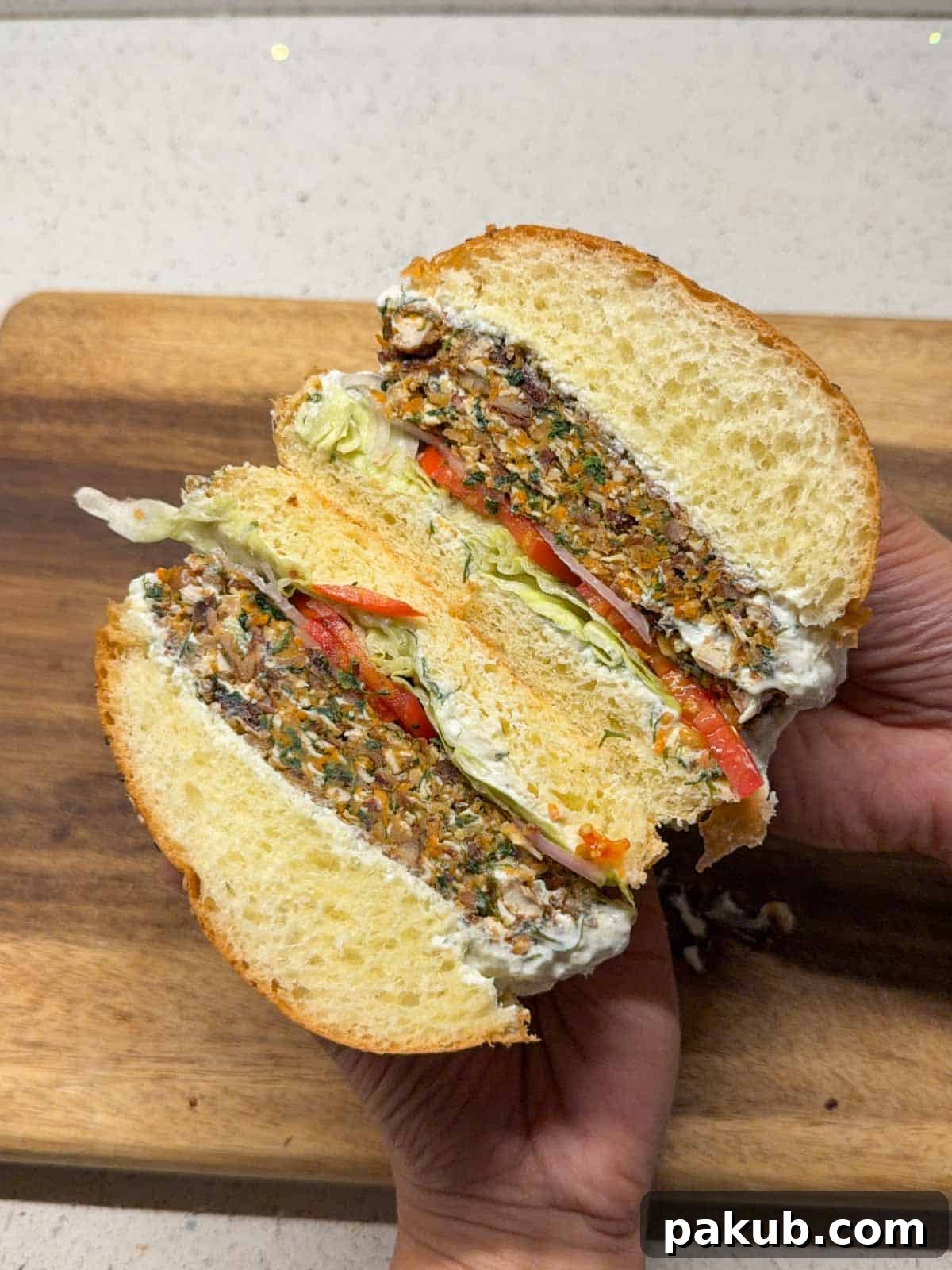 Crispy Vegetable Smash Burger Cooked in a Skillet 3 crispy veggie burger cut in half to showcase its texture